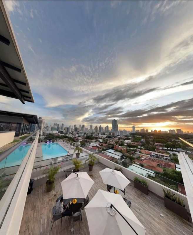 Rooftop infinity pool and terrace overlooking Panama City skyline at PH Coco del Mar luxury apartments