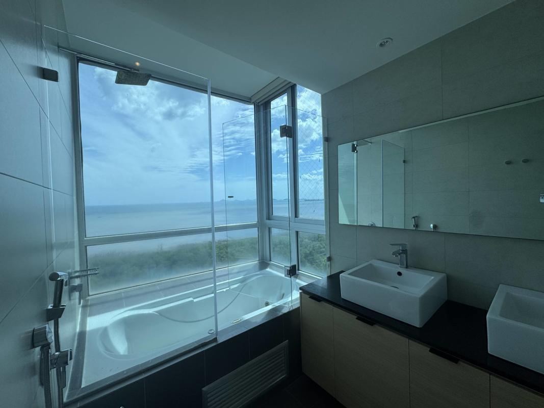 Elegant master bath with ocean view tub, double sinks and modern design in PH Altamar del Este Panama City