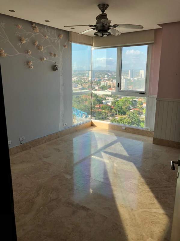 Spacious bedroom featuring marble floors large corner oceanview windows in PH Riviera del Mar Panama City