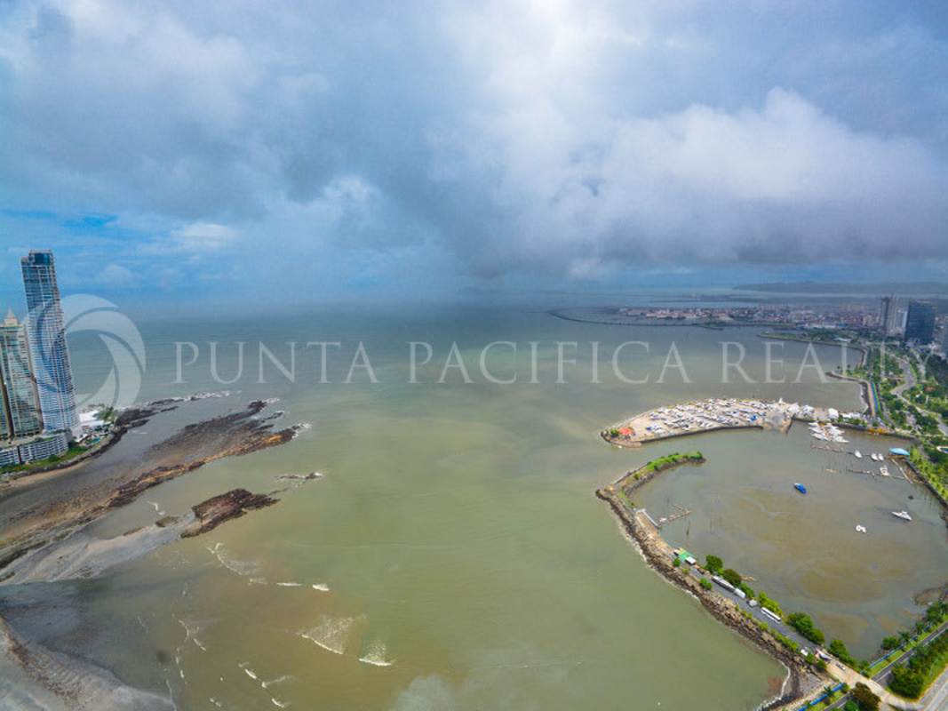 Modern kitchen with premium appliances granite counters in Yoo Panama Punta Paitilla rental apartment