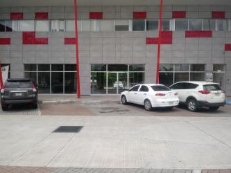 Unfinished commercial space with tile flooring and drop ceiling grid at David Commercial Plaza