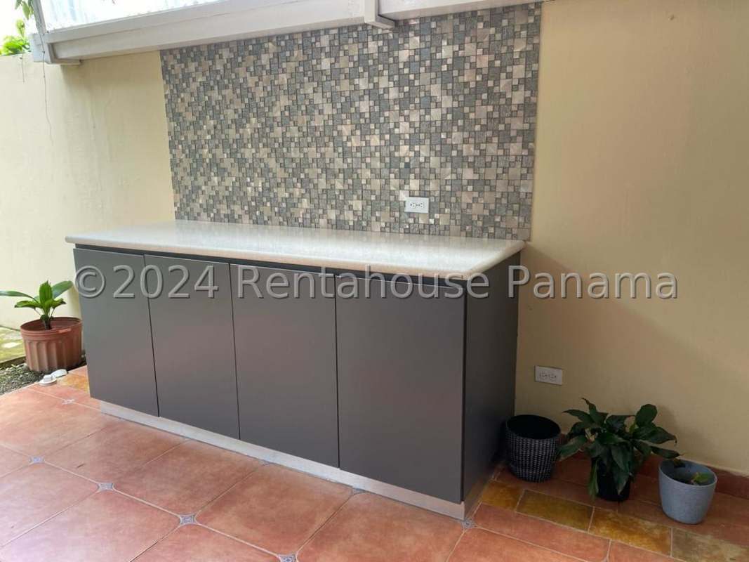 Outdoor patio with granite counter, plants, tile details Costa del Este Panama