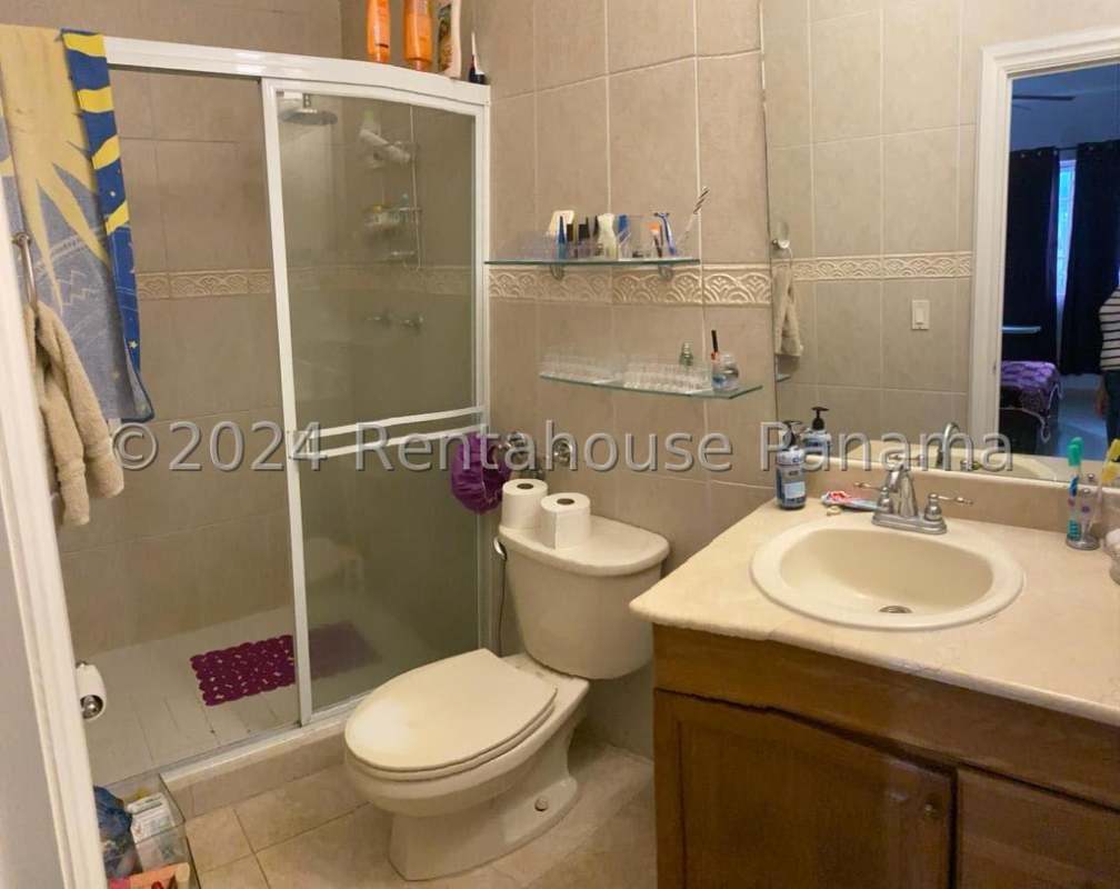 Covered terrace patio with ceiling fan, sink, outdoor kitchen Costa del Este house Panama