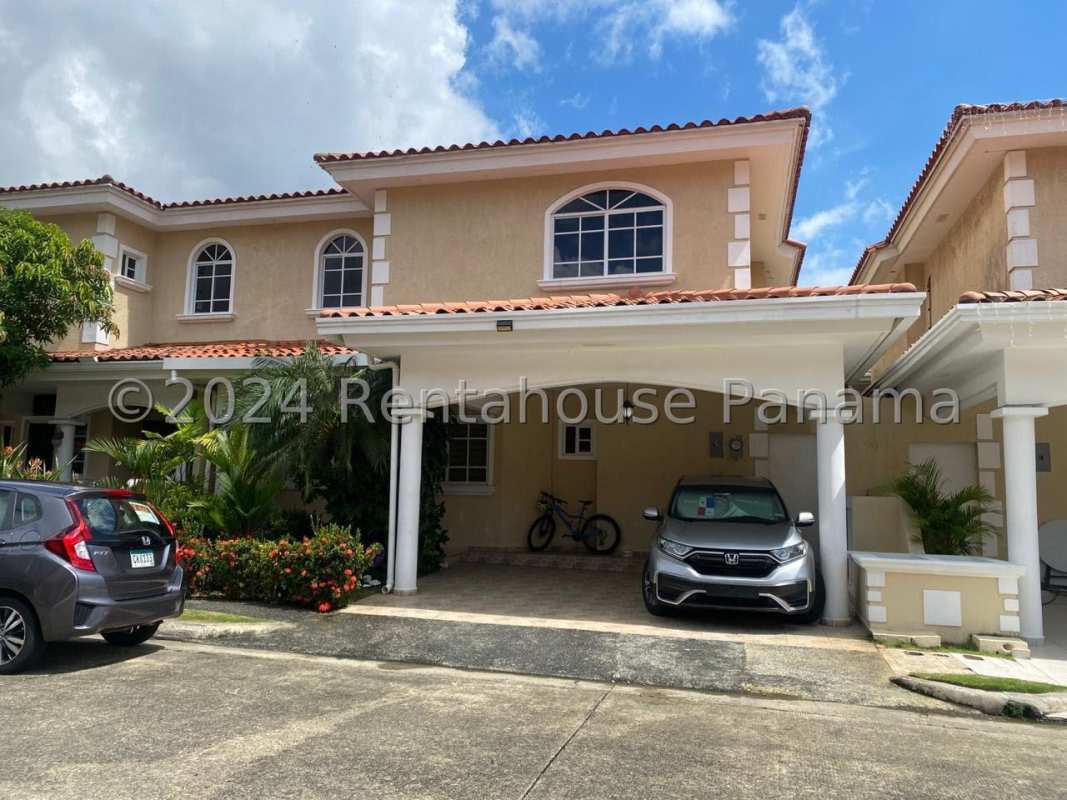 Mediterranean style house with arches, red tile roof, garden Costa del Este Panama City