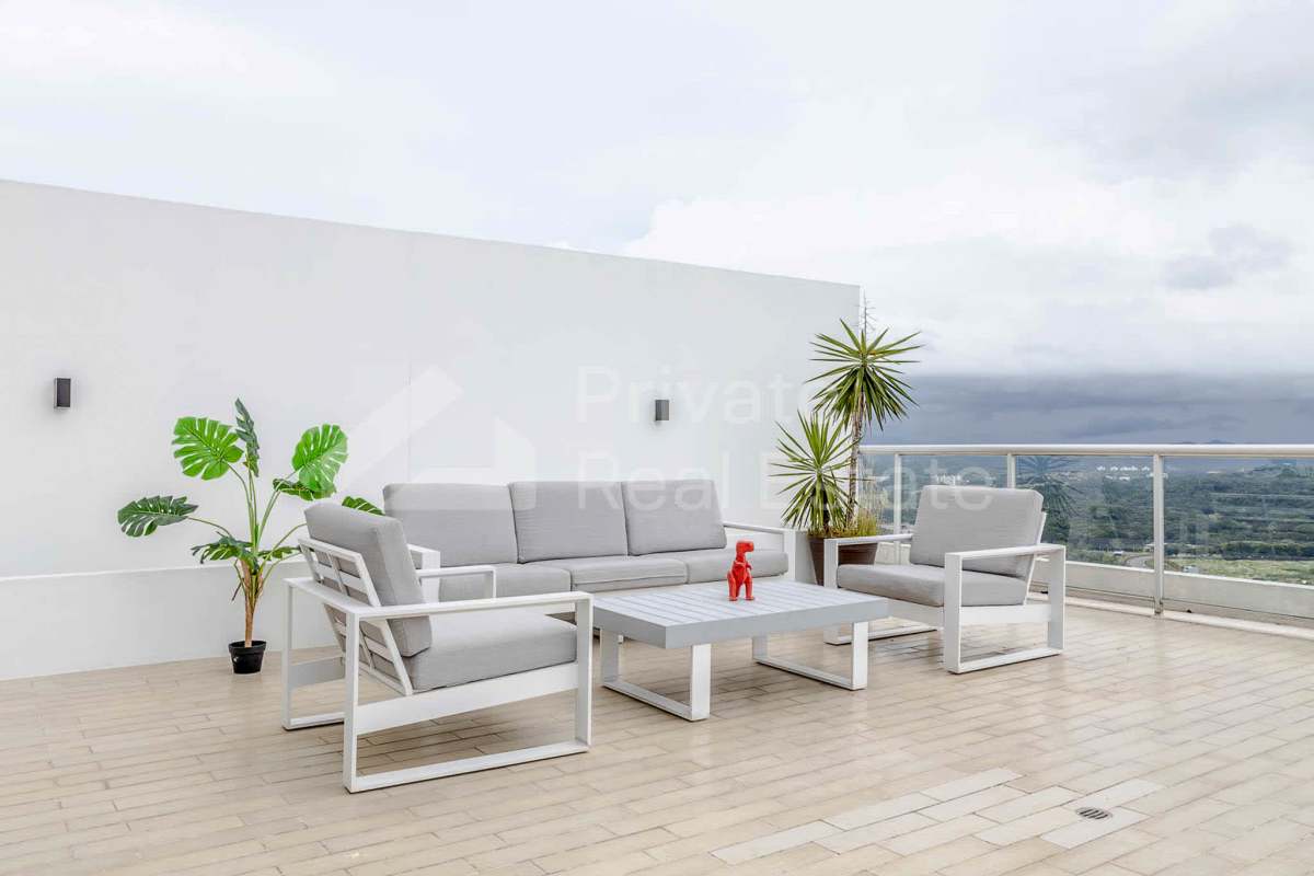 Expansive wrap-around terrace overlooking ocean and skyline PH Yacht Club Panama City