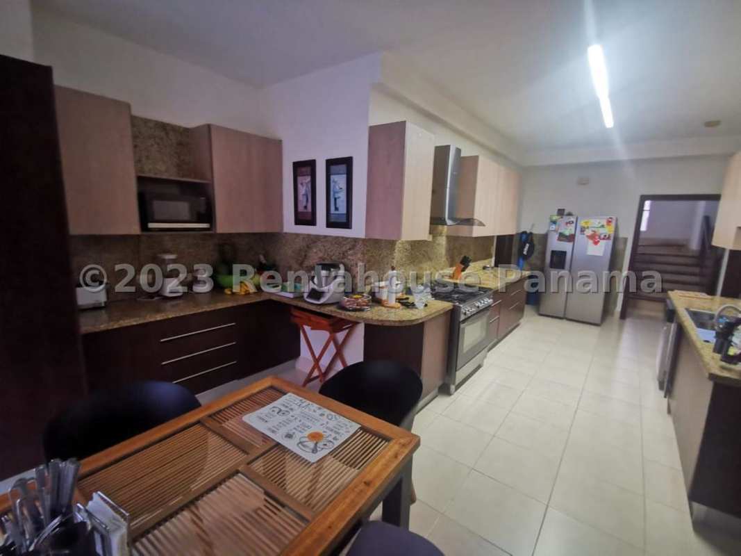 Modern kitchen with granite countertops, stainless appliances luxury house Costa del Este Panama