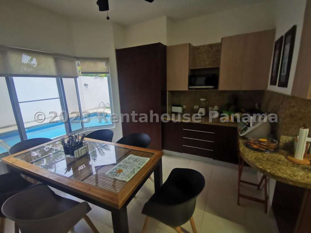 Bright dining room with large windows Mediterranean villa Costa del Este Panama City