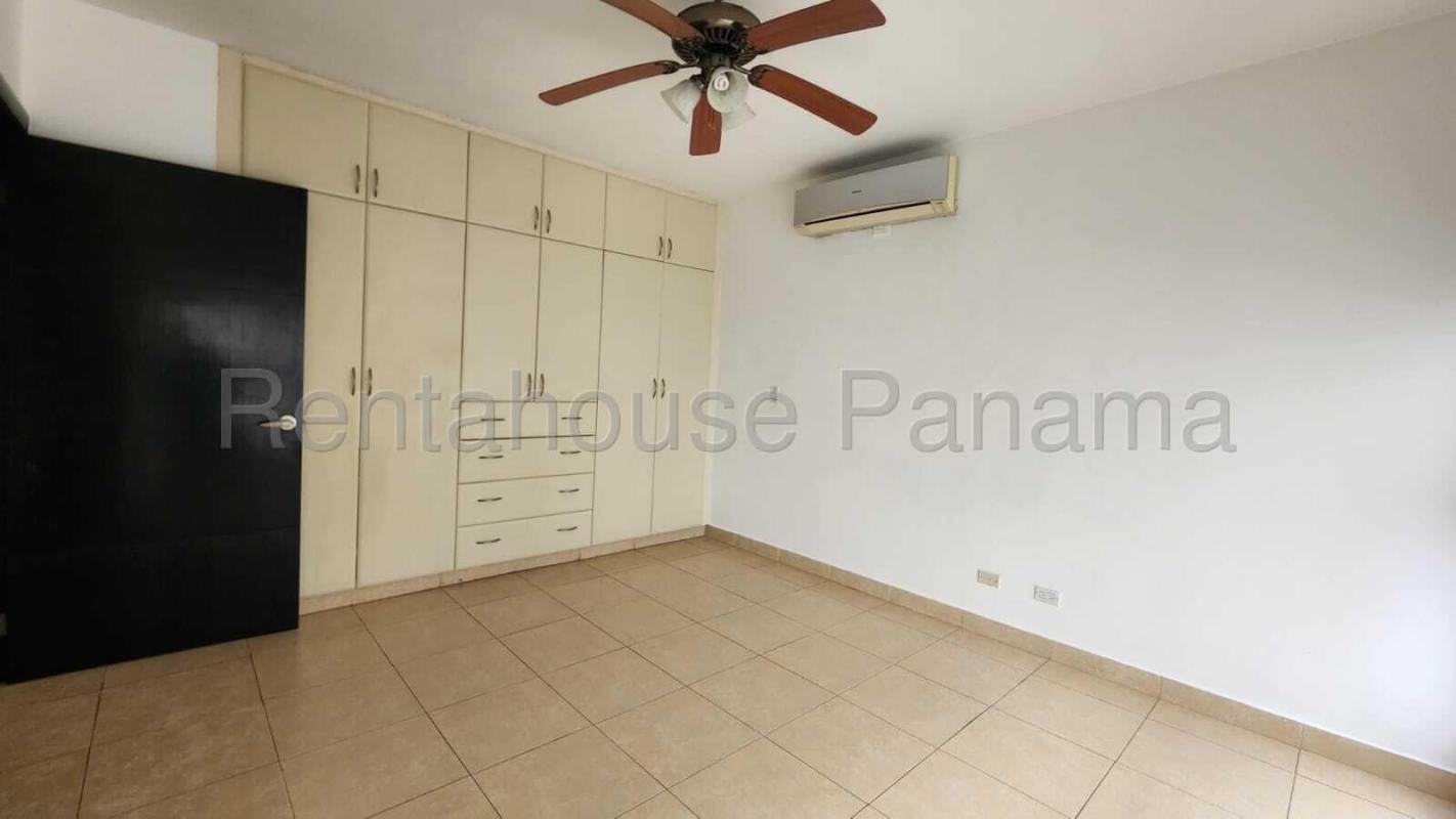 Master bedroom with large windows ocean view and walk-in closet PH Titanium Costa del Este Panama City