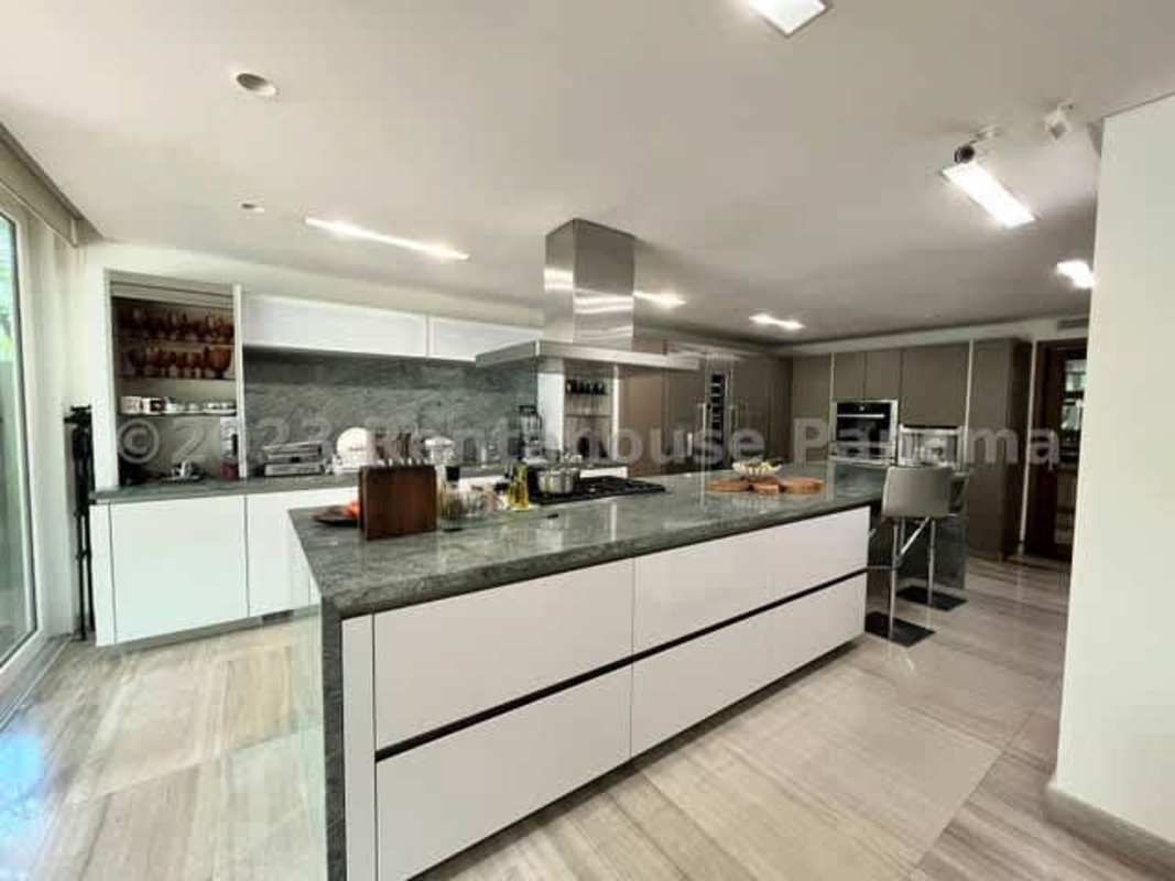 Luxury private pool with sundeck, tropical landscaping in Costa Sur house for sale Panama