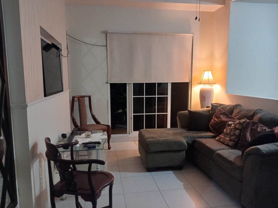 Spacious kitchen with granite countertops and cabinetry in gated Versalles home for sale Panama City