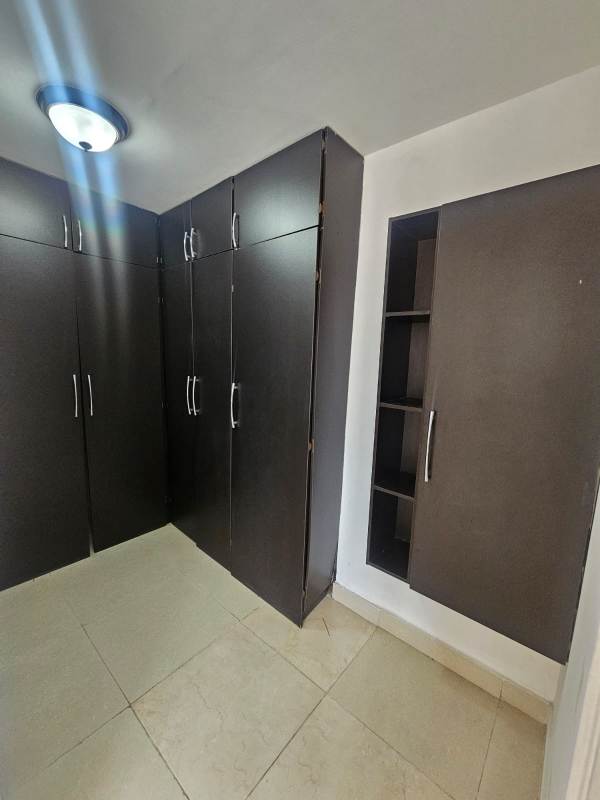 Modern bathroom with glass shower enclosure and elegant fixtures at Dos Mares View II Panama