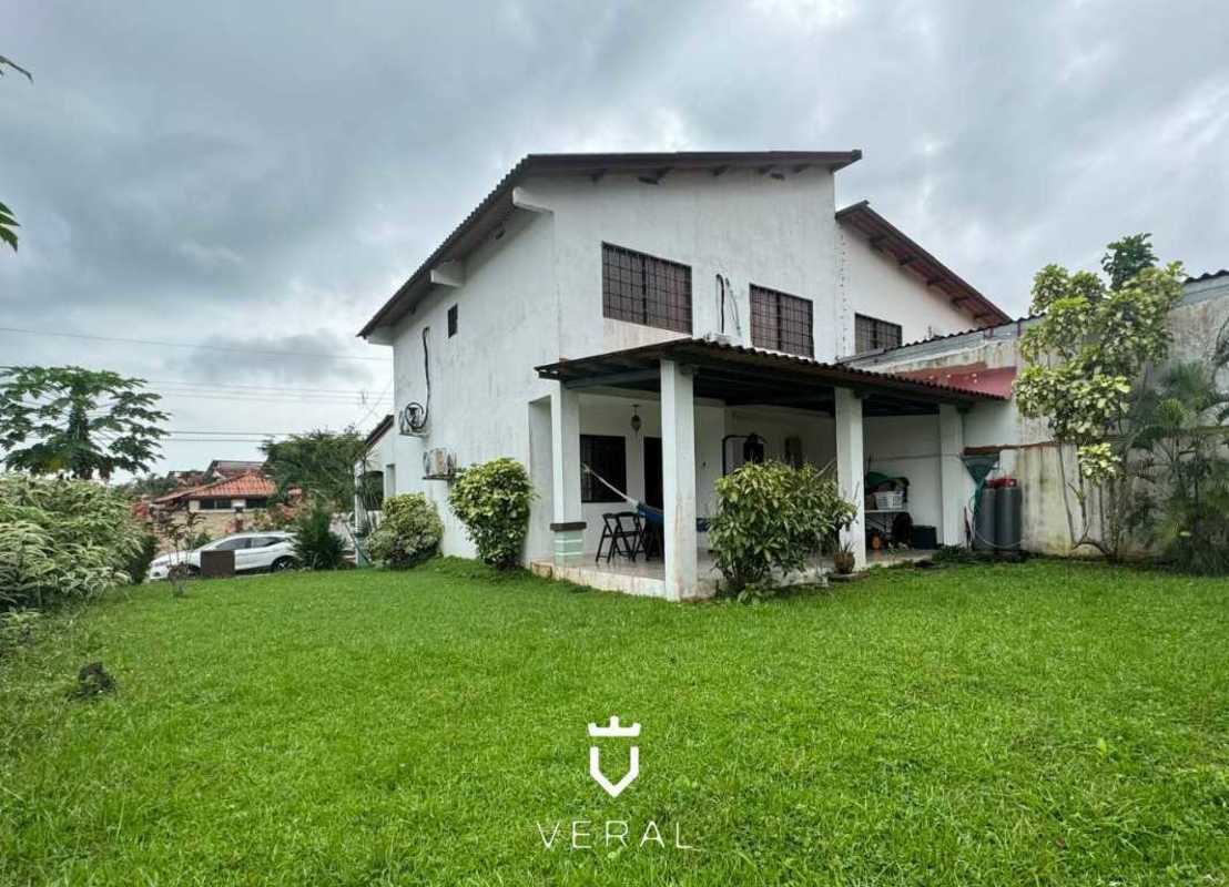 Open plan living dining space with marble floors and large windows in Quintas del Lago Panama Norte