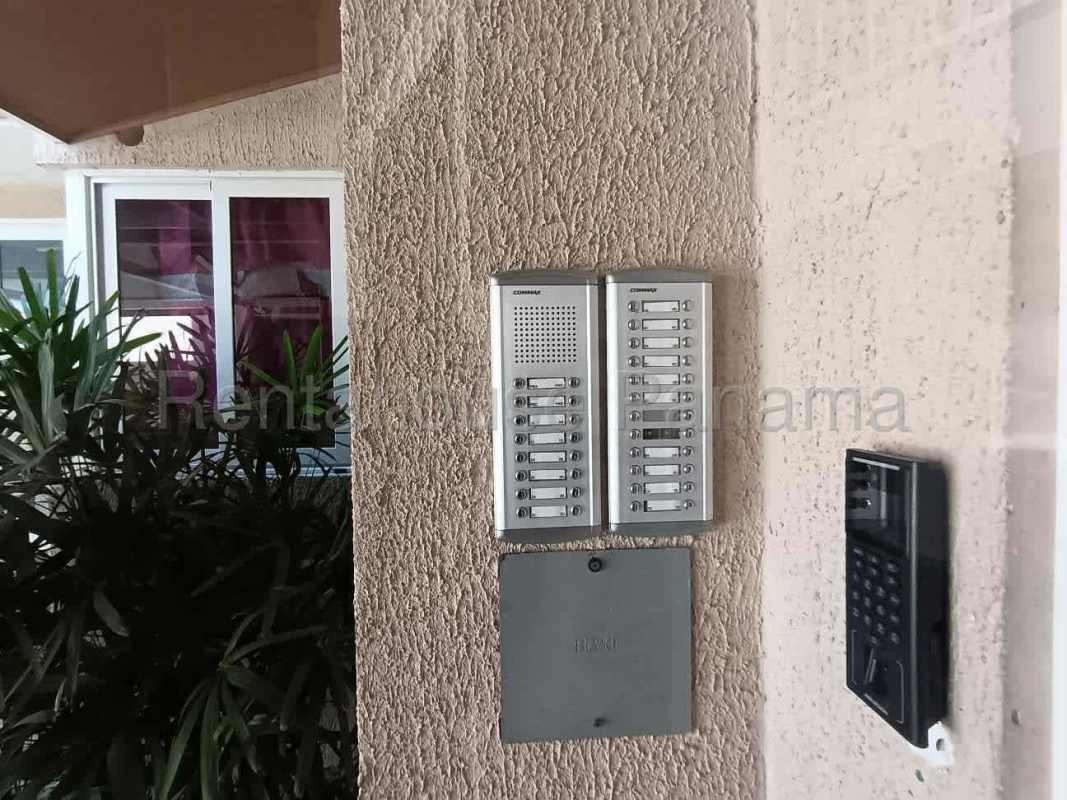 Spacious bright living room with porcelain floors and view of balcony in Costa Sur Panama