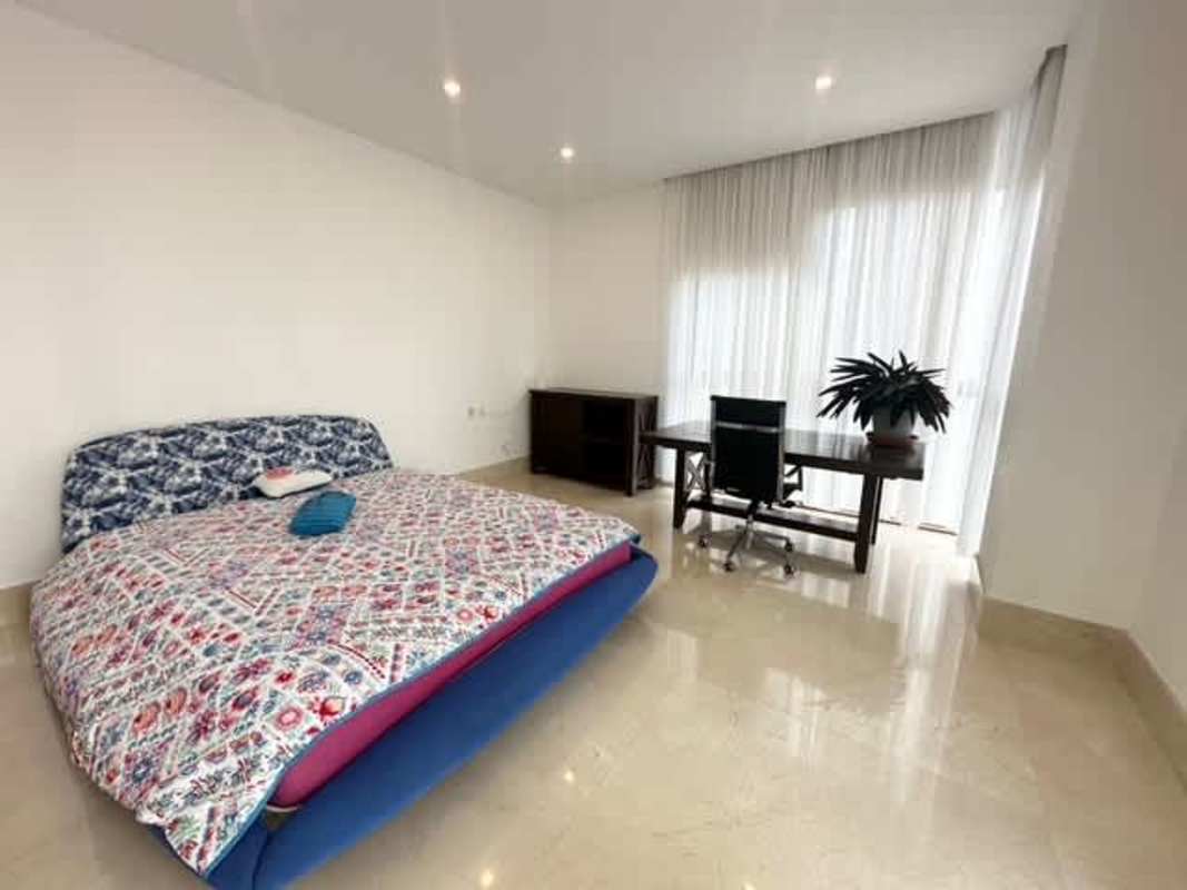 Modern bathroom marble double sink luxury furnished apartment Punta Pacífica Panama