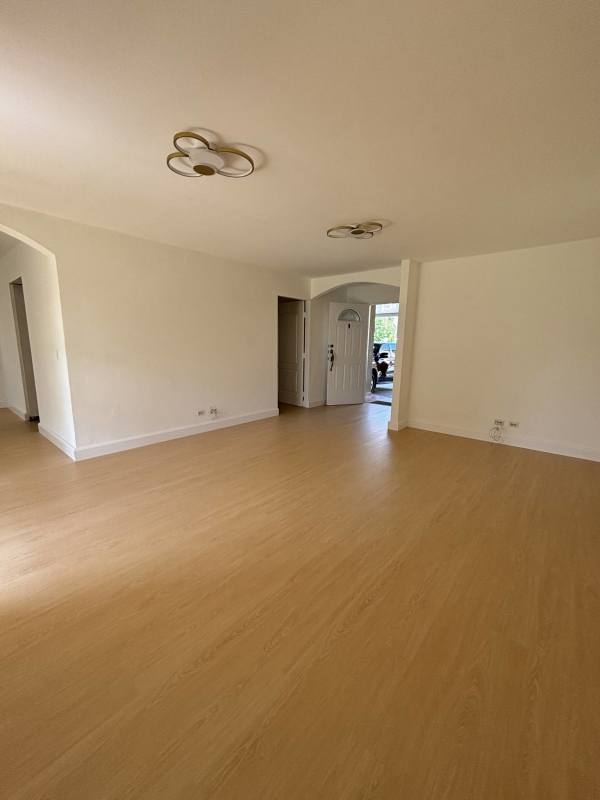 Gated community view with two-story Mediterranean design houses and landscaped lawns in Clayton Panama