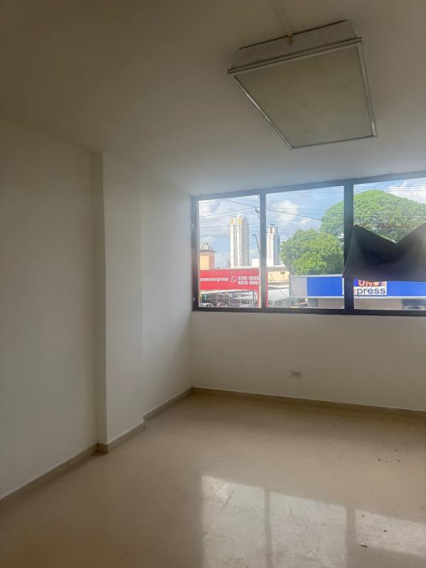 Bright empty office space with large windows tiled flooring Business Plaza Via Brasil Panama City