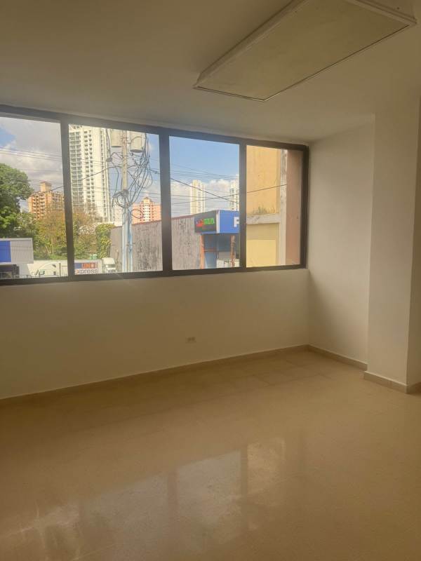 Bathroom inside office space tiled walls toilet sink in Business Plaza Via Brasil Obarrio Panama