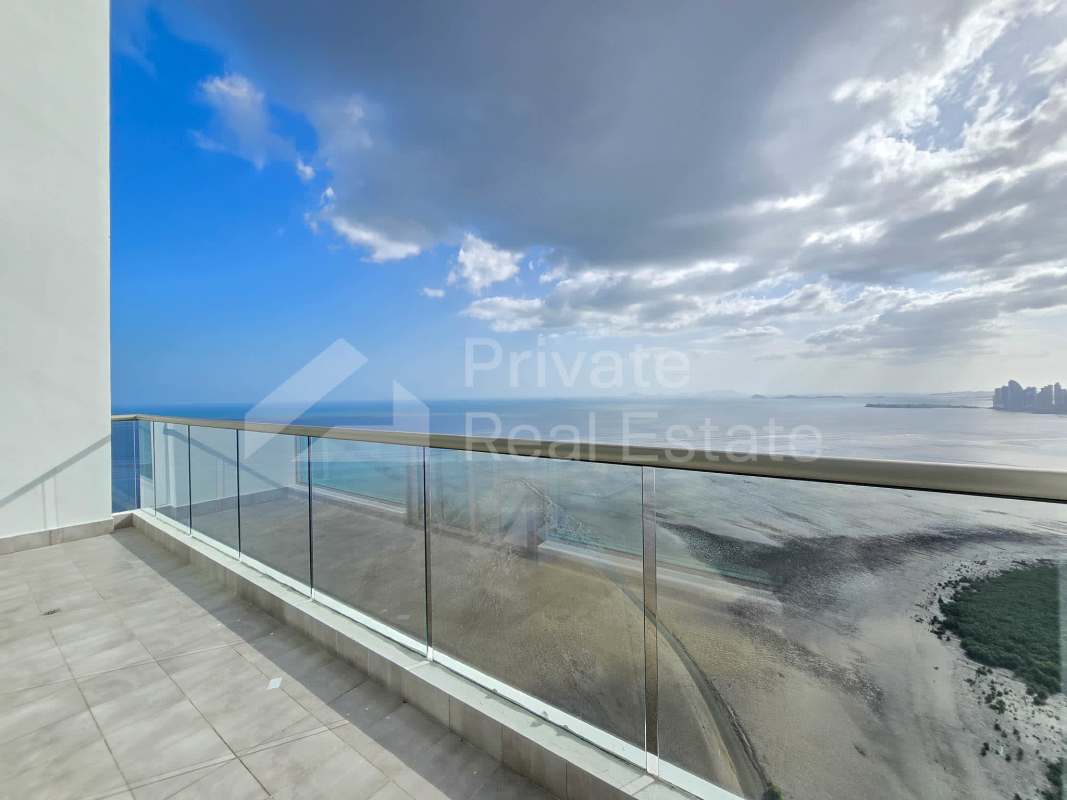 Modern kitchen with island and premium finishes in penthouse at PH Paramount Costa del Este Panama