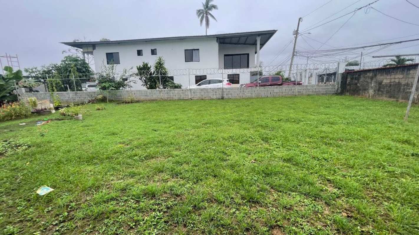 Two-story structure on fenced corner lot ideal for development in MetroPark Panama