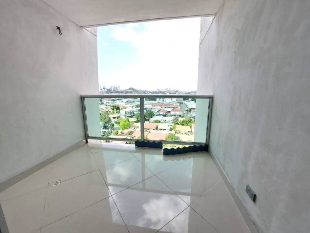 Spacious bedroom with air conditioning, built-in wardrobe, tiled floor at PH Leaf Tower Panama City