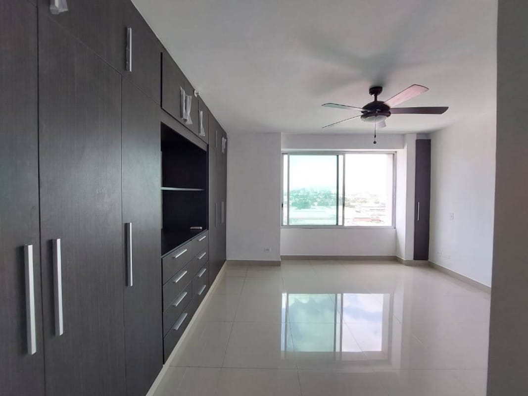 Bedroom with large window, built-in closet, air conditioning at PH Leaf Tower Panama City