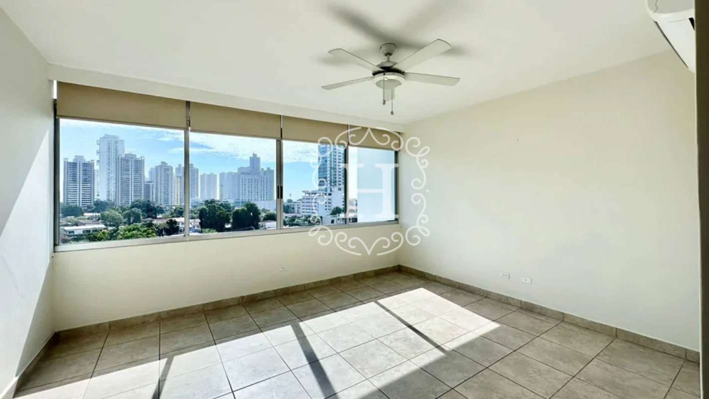 Granite kitchen with large window and city view in PH Terrazas del Pacífico San Francisco Panama