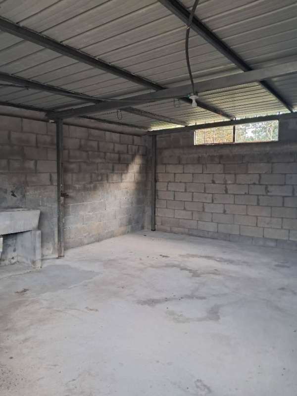 Concrete storage or garage with utility sink rental house Trebol 2 Pacora Panama