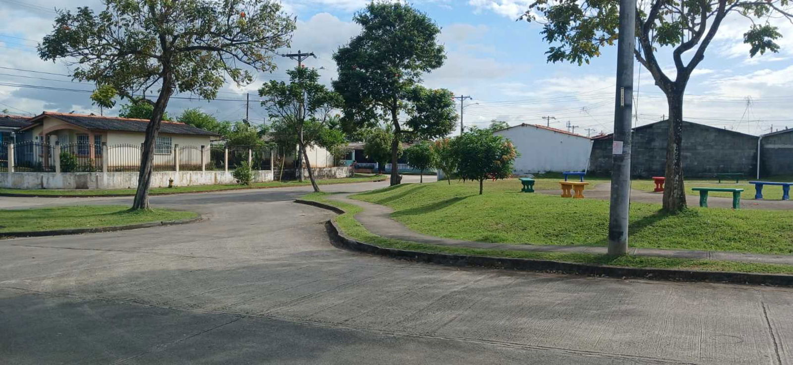 Bright open-plan living and dining area with tiled floor affordable Panama home
