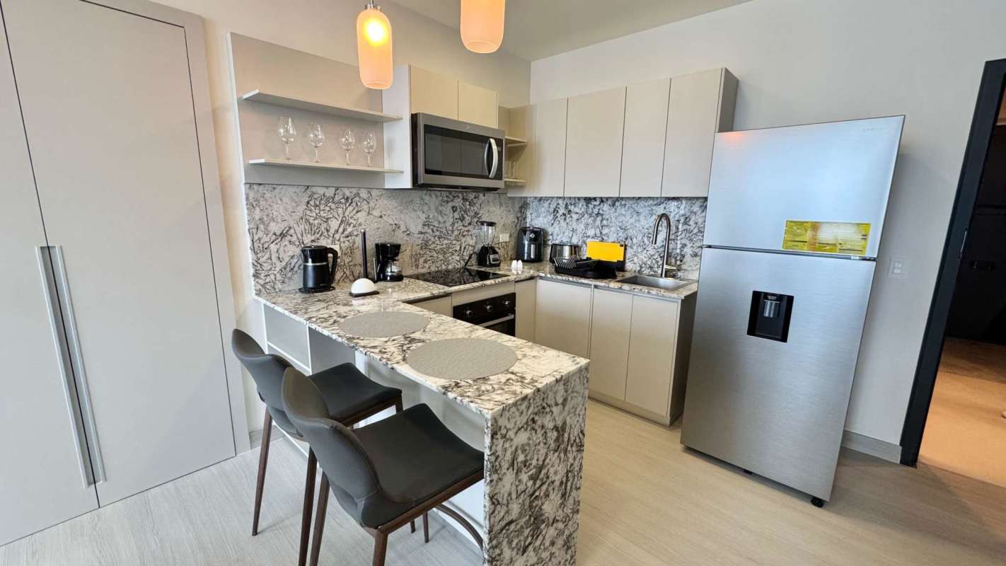 Rooftop swimming pool with panoramic city and ocean view at PH Arcadia Costa del Este