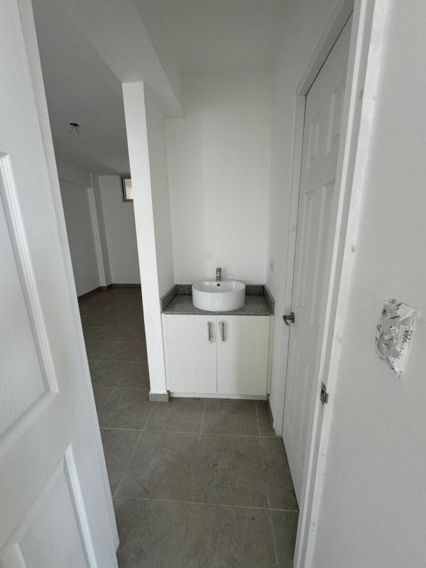 Compact modern bathroom vessel sink granite countertop in Residencial Las Acacias Panama