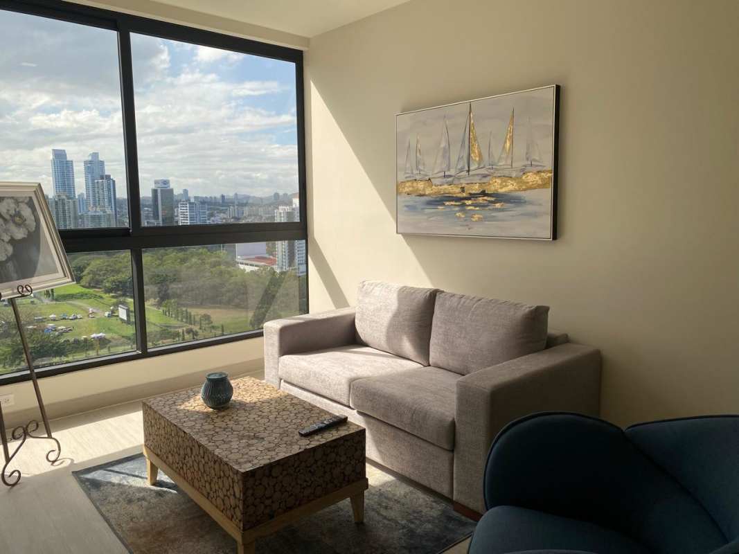 Living area with large windows balcony panoramic Costa del Este skyline PH Arcadia Panama