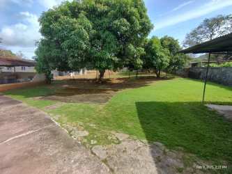 Large backyard with trees shaded area fence Carnival rental house Coclé Panama