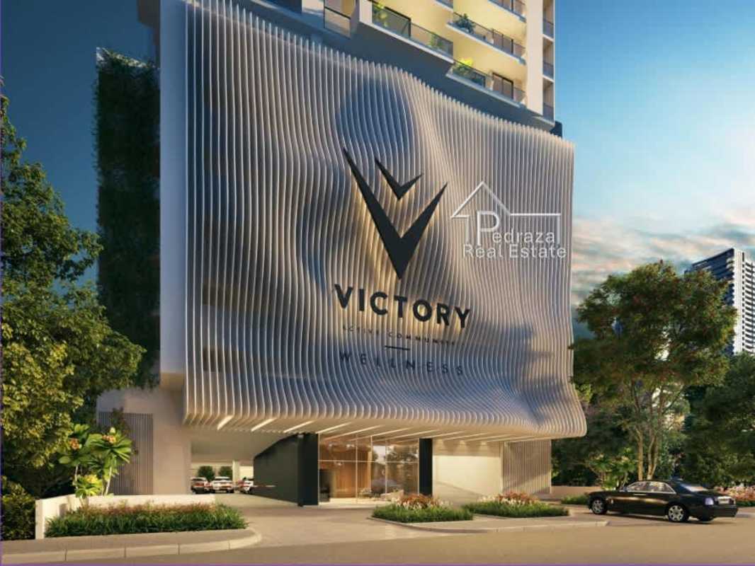 Night skyline aerial of PH Victory Wellness on Coco del Mar waterfront Panama City