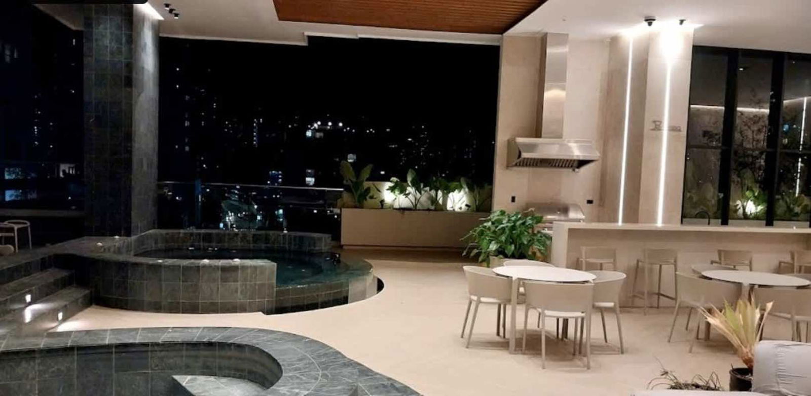 Jacuzzi lounge area with skyline view inside PH Victory Wellness in Coco del Mar Panama City