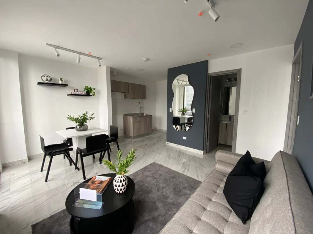 Open concept living and dining with marble porcelain floors at PH Marvela Calle 50 Bella Vista