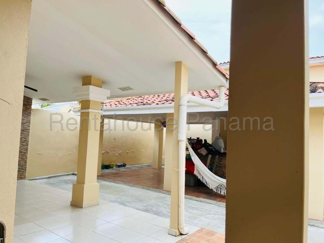 Large open living room with windows and tile floors in Villa Tivoli Brisas del Golf Panama