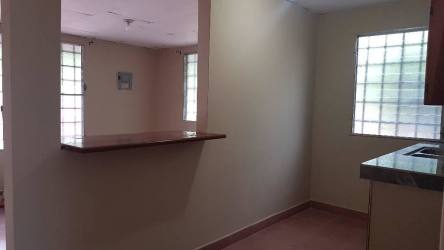 Traditional style kitchen with marble countertops, glass block window in David for rent