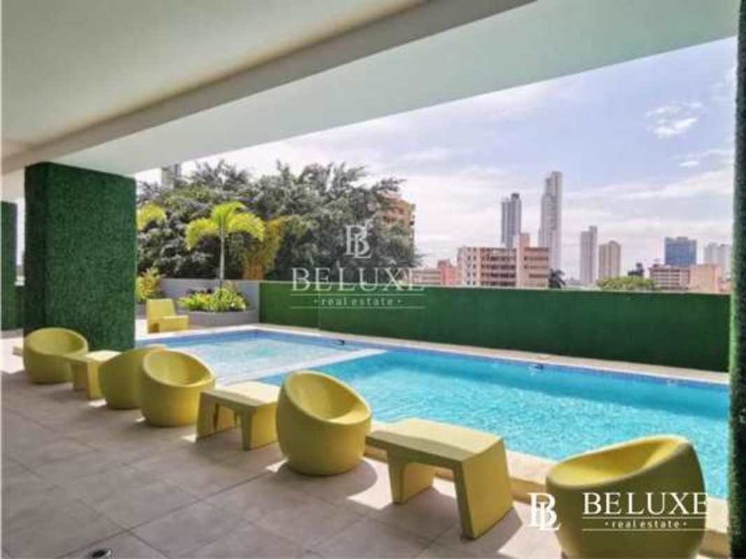 Rooftop pool and lounge area offering skyline views at PH El Botánico Panama
