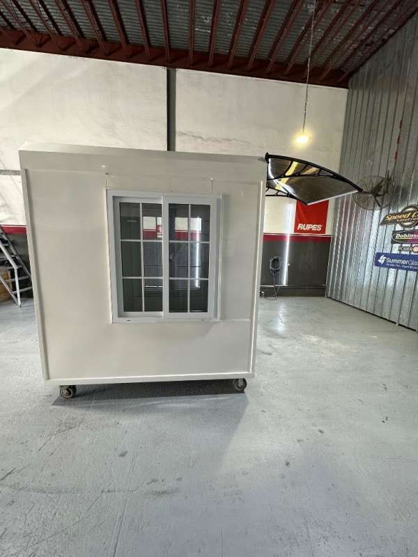 Industrial warehouse with portable guard booth on wheels in Santa María Costa del Este Panama