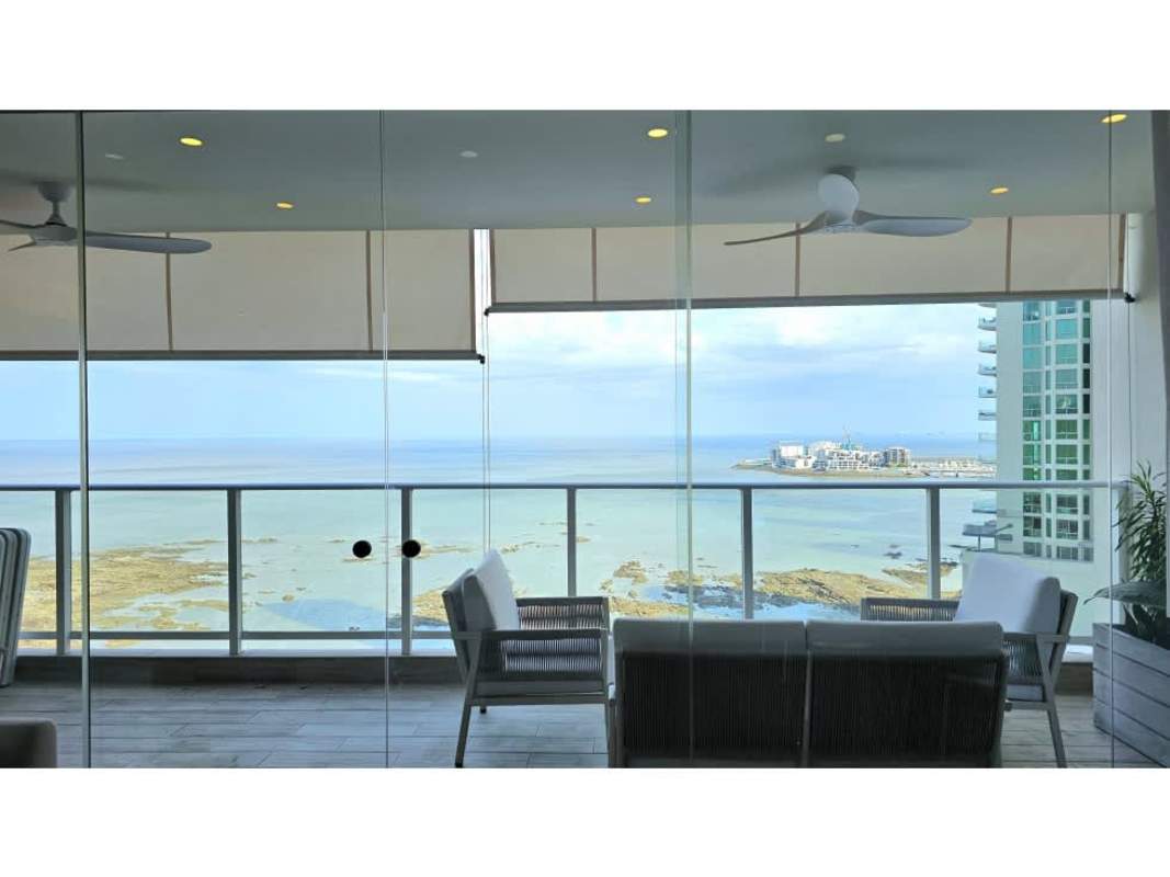 Large oceanfront balcony with seating area in PH Oceanaire Punta Pacífica Panama
