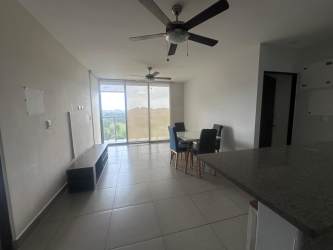 Living and dining space with natural light and ceiling fan PH Woodlands Panama Pacifico