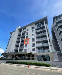 Contemporary kitchen with granite counters, stainless appliances in PH Woodlands Panama Pacifico