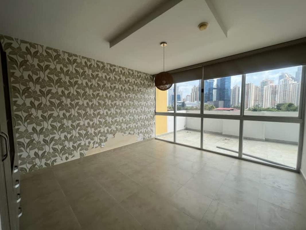 Bedroom with tile floors and large window, Panama skyline at PH The One Tower