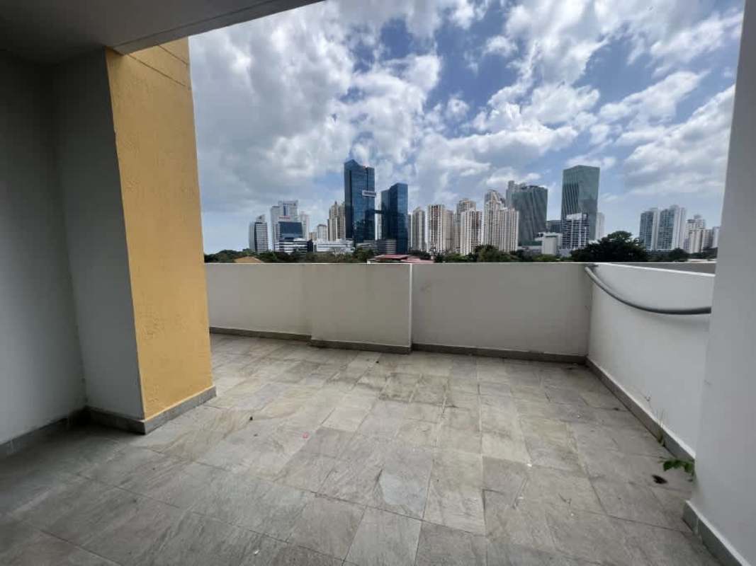 Modern kitchen with granite bar, wood cabinets at PH The One Tower San Francisco Panama
