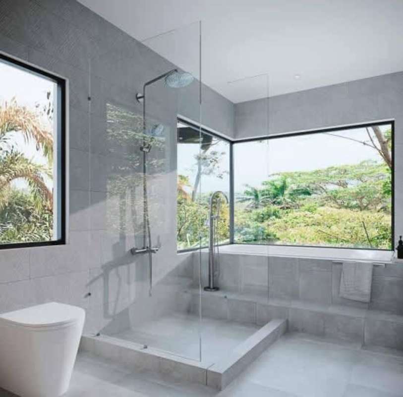 Spacious open-plan living dining with sliding doors, garden views, modern design Ancon Panama