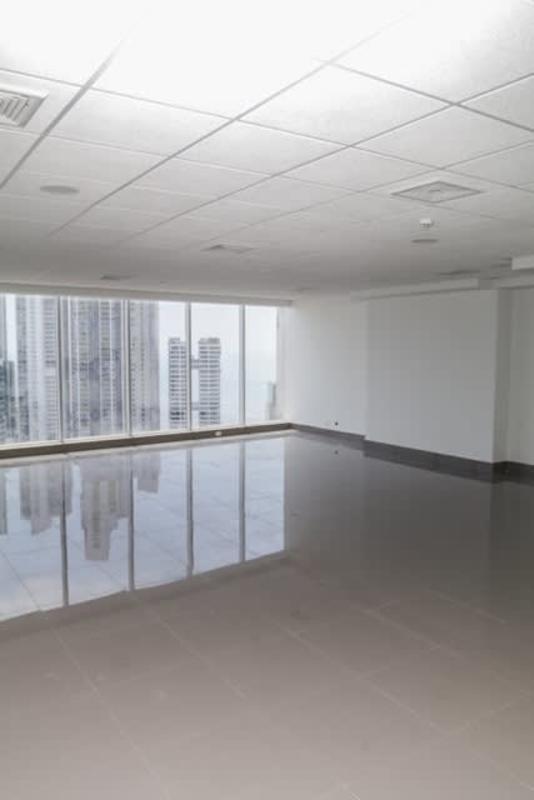Large empty office with tile floor and floor-to-ceiling windows, PH BICSA Financial Center