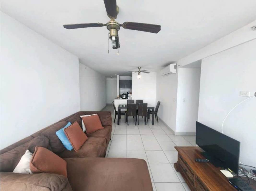 Indoor gym with fitness equipment and city view windows PH Premium Panama City