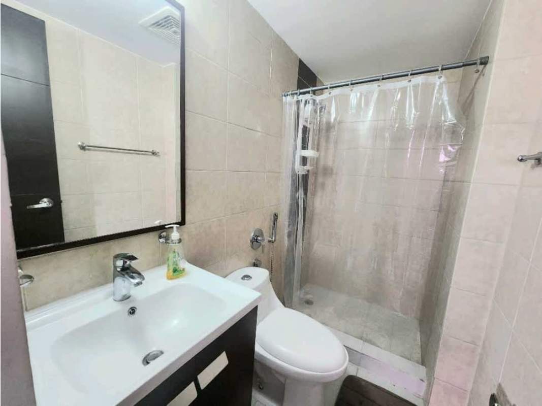 Bathroom with ceramic tiles, walk-in shower, vanity sink in PH Premium near Via España Panama City