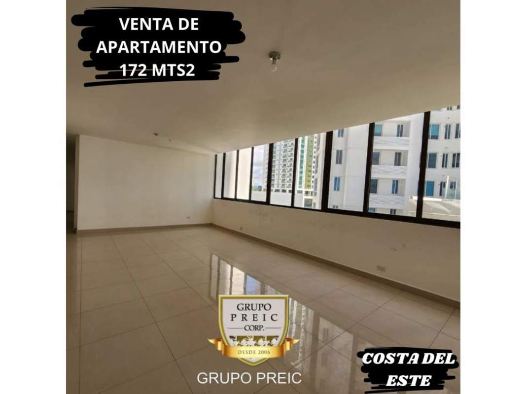 Kitchen with granite countertops, light cabinets, tiled walls in Brisa Marina Costa del Este