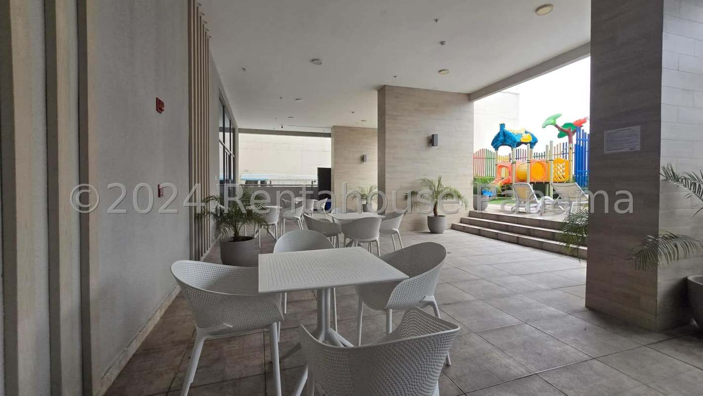 Tall residential tower with balconies modern facade PH Carrasquilla Plaza near Via España Panama City